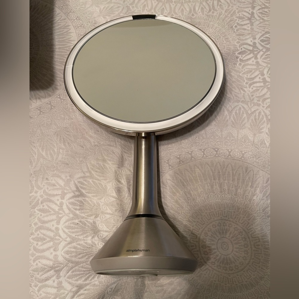 Simplehuman Sensor Mirror 5X Magnification with charging cord.